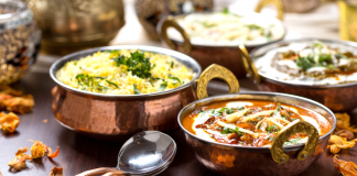 Annapurna Indian dishes laid out on a table at Annapurna